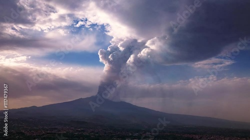 Aerial ascending hyperlapse of Mount Etna in Sicily with smoke from the crater during eruption