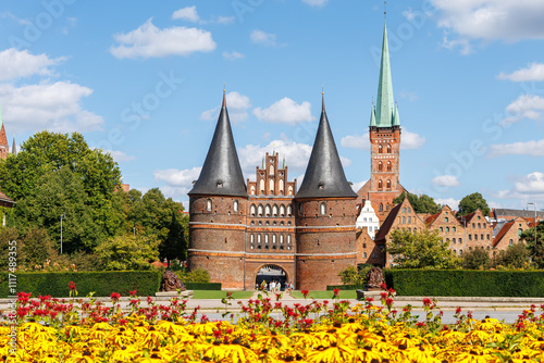 Holsten Gate Holstentor with flowers Hanseatic city of Lübeck in Germany