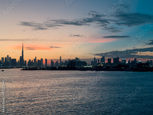 Stock image of Dubai skyline at twilight, Downtown Dubai view from creek harbor, Premium waterfront view from balcony