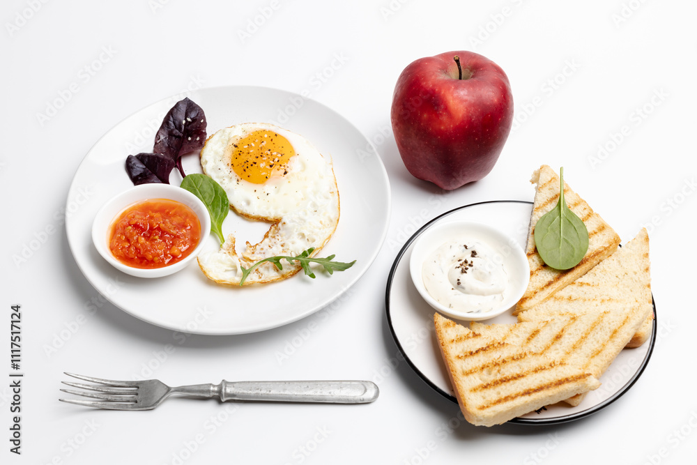 Fried egg on the plate, grilled toasts and an apple, Fried egg on the plate, grilled toasts and an apple,