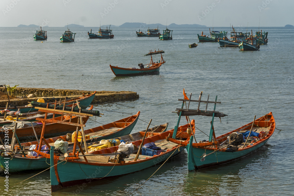 Crab fishing boat resting on the shore in Ket, Cambodia Crab fishing boat resting on the shore in Ket, Cambodia
