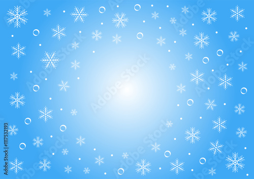 Winter wonderland background filled with delicate snowflakes and sparkling bubbles in a soft blue hue