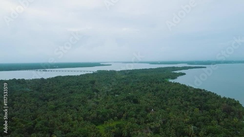 Wallpaper Mural Bridge connecting two islands, Morning areal view of a beautiful green island in Vembanadu lake in Kerala. Areal view of Coconut Plant rich area, Perumbalam, Alleppy.India,Asia Torontodigital.ca