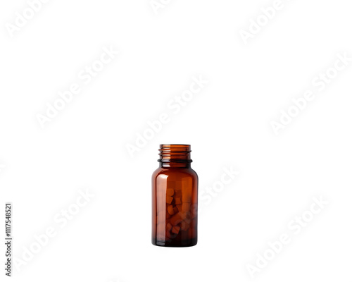 a brown bottle with a small pill in it