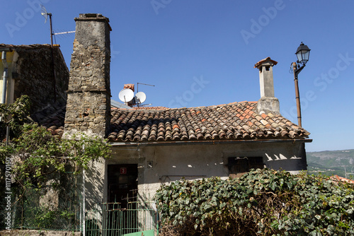 A quaint stone house, bearing the marks of time, stands serenely in the historic town of Motovun, nestled in the tranquil region of Istria, Croatia