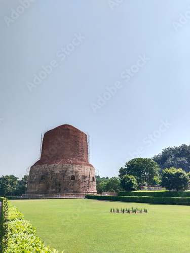 Dhamekh Stupa in Panchaytan temple ruins, Sarnath, Varanasi, India landmarks history is buddhist travel.. photo