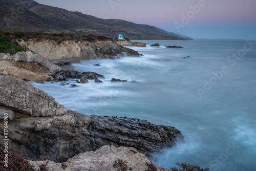 Waves crash on Malibu's rocky cliffs