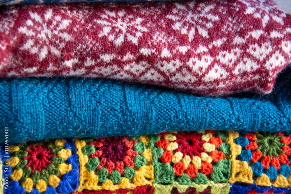 Stack of beautiful multi-colored knitwear Stack of beautiful multi-colored knitwear