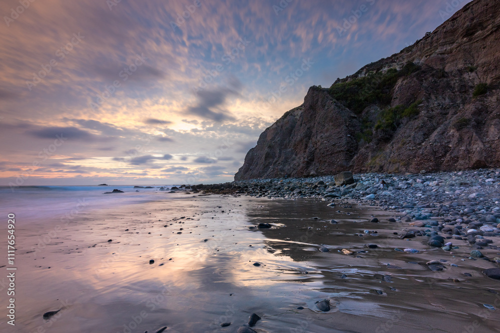 Sunset reflections at Dana Cove in California