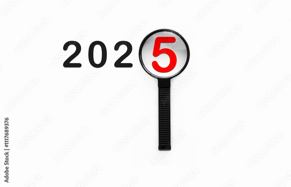 Magnifying glass focusing on 5 of year 2025 for new business linked to happy new year and merry Christmas concept Magnifying glass focusing on 5 of year 2025 for new business linked to happy new year and merry Christmas concept