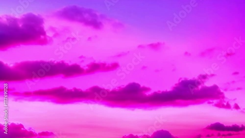 Clouds changing colors from pink to purple during a beautiful sunset.
