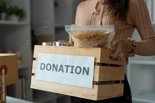 Volunteers Organizing Donations at Food Banks and Community Centers to Support Local Families in Need photo