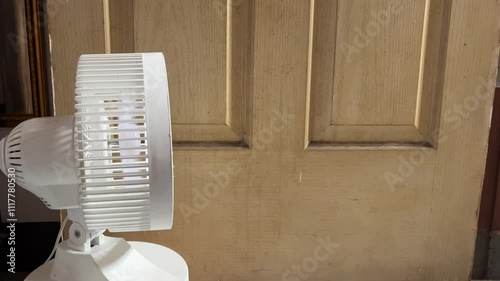 white fan turn on with copy space background 