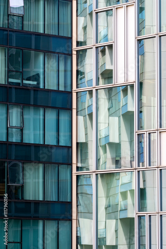 An abstract view of intricate glass structures showcasing stunning reflections and dynamic shapes, embodying modern architectural creativity and urban sophistication in London UK photo