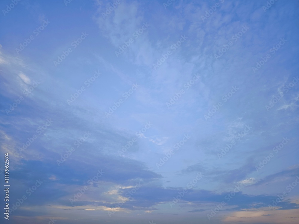Sunlight, clouds on the background of the morning sky. Blue, white sky in pastel colors, sun glare from a soft-focus lens. Abstract blurred blue gradient on the background of peaceful nature. Sunlight, clouds on the background of the morning sky. Blue, white sky in pastel colors, sun glare from a soft-focus lens. Abstract blurred blue gradient on the background of peaceful nature.