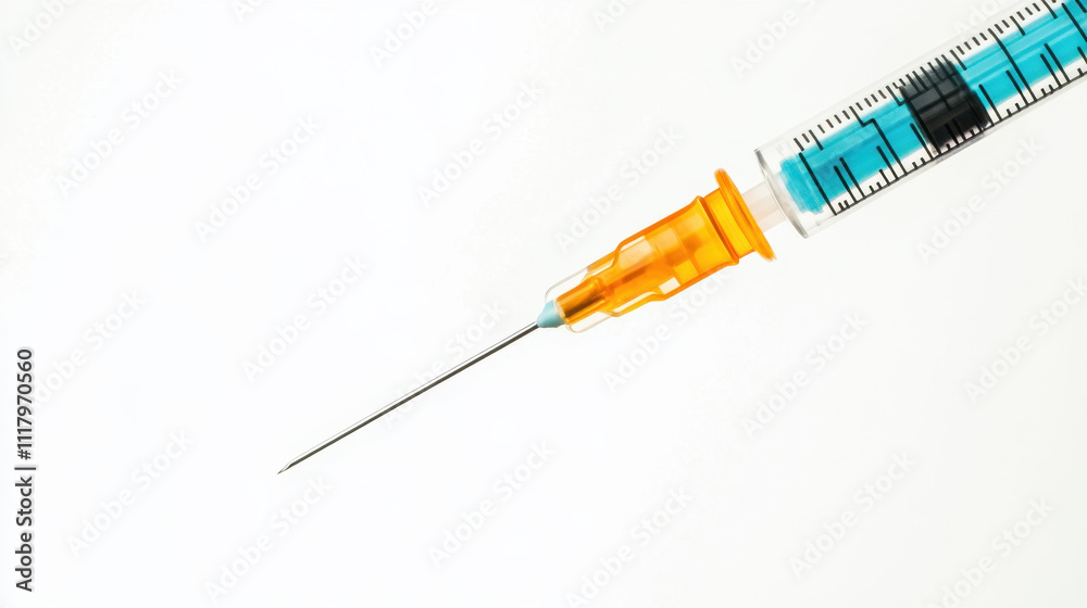 Close-up of a syringe with a clear needle and orange safety cap against a white background, highlighting medical precision and healthcare tools. Close-up of a syringe with a clear needle and orange safety cap against a white background, highlighting medical precision and healthcare tools.
