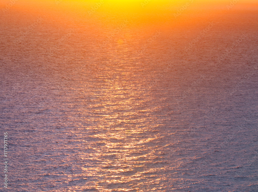 Magical view of the sunny path to the sea at sunset.