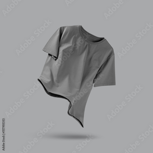 Grey t-shirt in air on color background