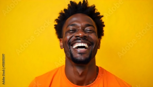 A happy black African American man on a bright yellow background