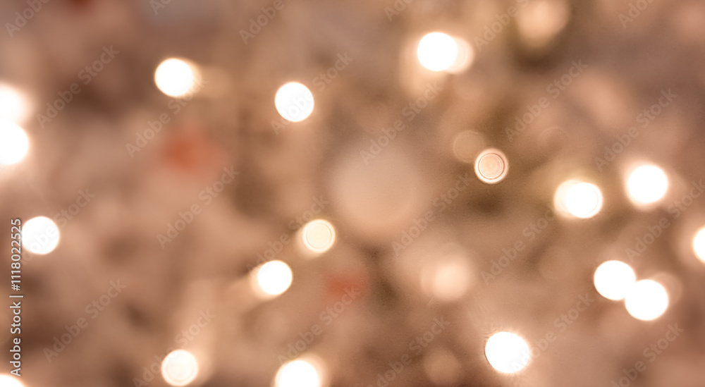 Elegant golden and brown blurred bokeh with glowing festive Christmas lights. Elegant golden and brown blurred bokeh with glowing festive Christmas lights.