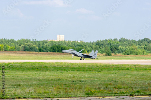 MAKS-2011 on territory of airfield LII im. Gromov. American twin-engine supersonic fighter McDonnell-Douglas F-15 "Eagle" on main landing gear on runway after landing.Zhukovsky, Russia August 16, 2011