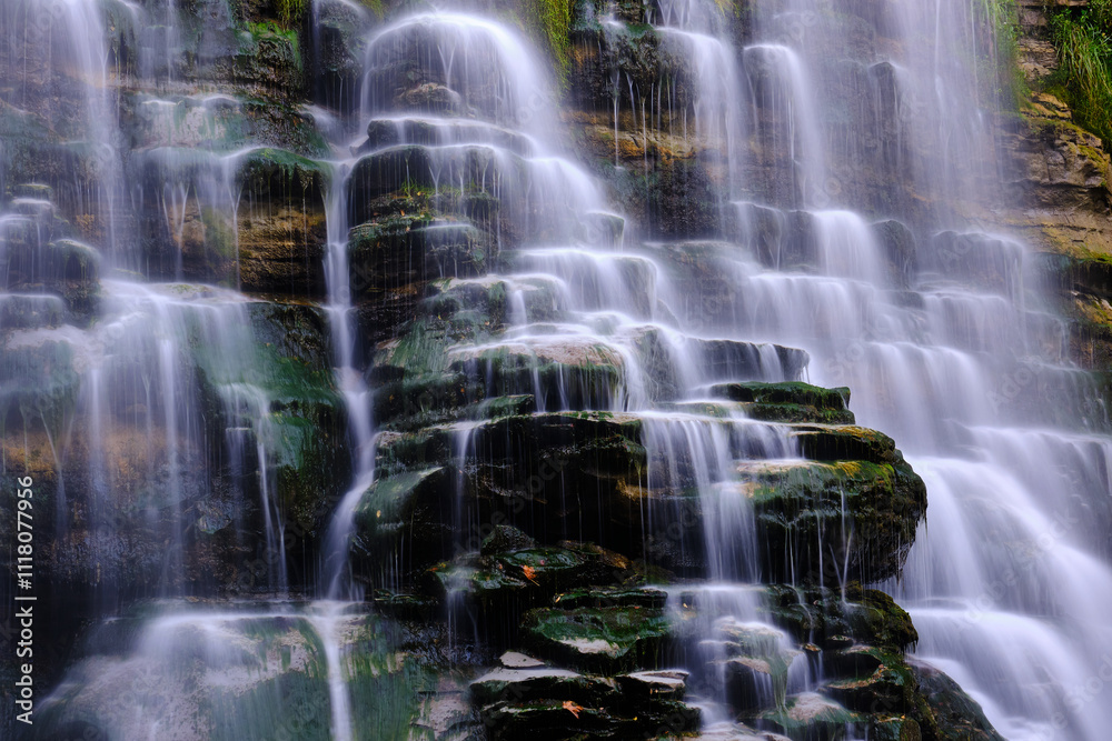 Fairy Alferello falls in The National Park of the Casentino Forests with silk effect during autumn season during a trekking, walking in Italy, Emilia-Romagna hills, relaxing and loud water Fairy Alferello falls in The National Park of the Casentino Forests with silk effect during autumn season during a trekking, walking in Italy, Emilia-Romagna hills, relaxing and loud water