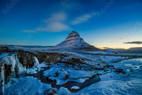 Kirkjufellsfoss Waterfall with Kirkjufell mountain at sunrise, Iceland, Europe, photo