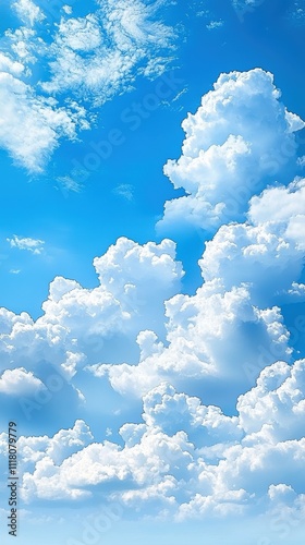 A bright blue sky filled with fluffy white clouds, creating a serene and uplifting atmosphere. photo