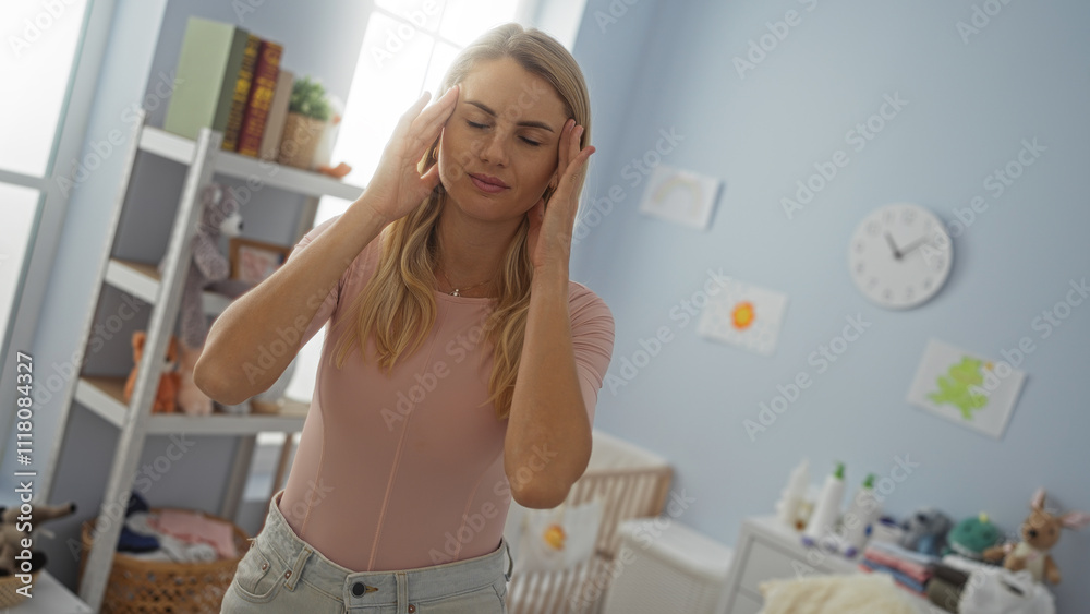 Woman with headache stands in baby room filled with toys and soft light reflecting suburban lifestyle and interior decor of a cozy family home.