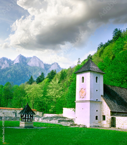 Obraz na płótnie The Red Monastery, ancient chapel in Red Cloister complex (slovak: Cerveny klastor) in Slovakia. The Red Monastery is situated in mountains close to the village of the same name. w salonie