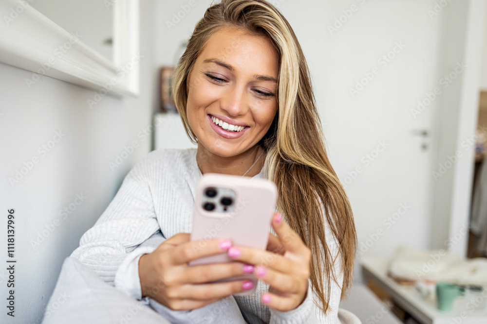 Young Woman Enjoying Smartphone Communication At Home Comfortably Young Woman Enjoying Smartphone Communication At Home Comfortably