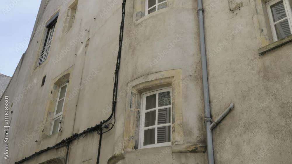 Unique architectural feature of an old building with a rounded turret, Nevers, Nièvre, Burgundy, France Unique architectural feature of an old building with a rounded turret, Nevers, Nièvre, Burgundy, France