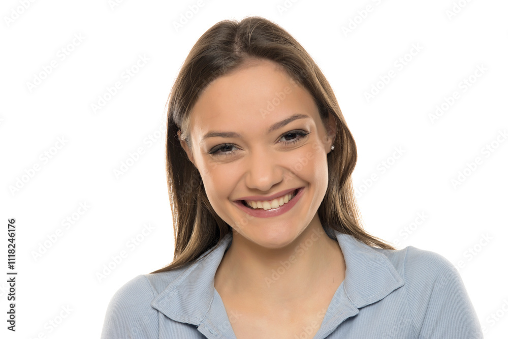 Portrait of a beautiful young happy woman with makeup on a white studio background Portrait of a beautiful young happy woman with makeup on a white studio background