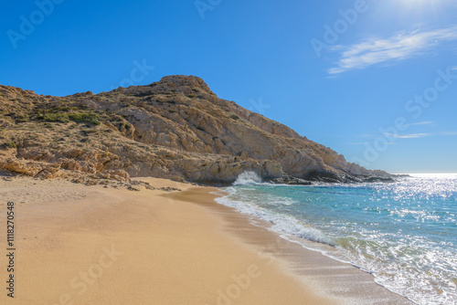 Santa Maria Beach, Cabo San Lucas, Mexico. Different stages of the fantastic ocean waves. Rocky and sandy beach.