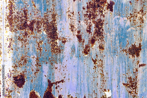 Fototapeta Naklejka Na Ścianę i Meble -  Texture of old rusty metal with scratches and mother-in-law. Abstract grunge metal texture with traces of multi-colored paint