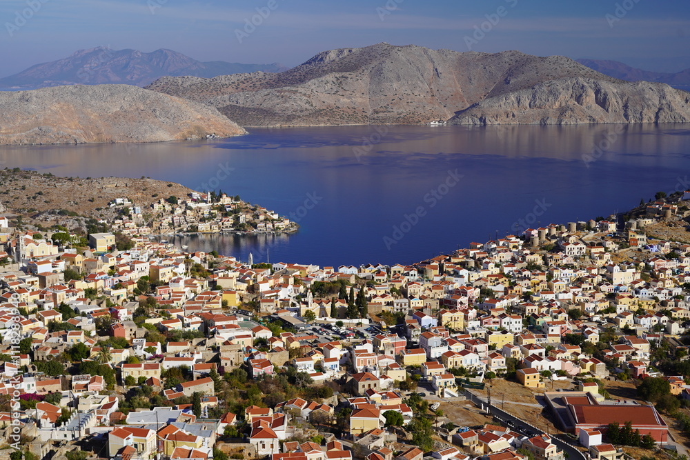 spectacular upper view over symi village and pedi bay spectacular upper view over symi village and pedi bay