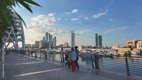 Abu Dhabi Modern Skyline Reflected in Al Bateen Marina. UAE capital city photo