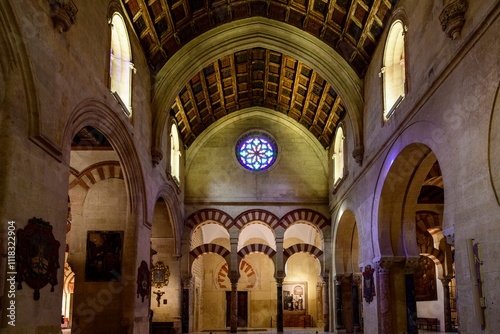 Obraz na płótnie Part of Mosque with view to the Gothic nave of the Villaviciosa Chapel, dating from the late 15th century and former main chapel of the cathedral Mosque-Cathedral of Cordoba. w salonie