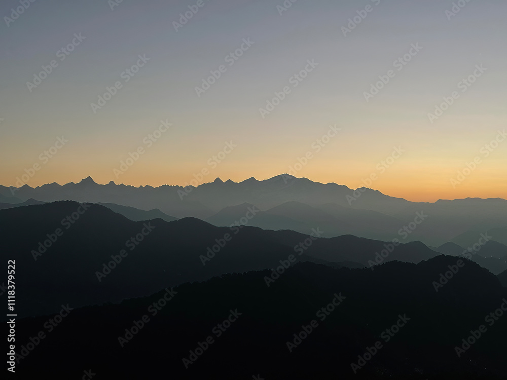 A beautiful view of Garhwal mountain range during the sunset from the outskirts of Chopta, Uttarakhand A beautiful view of Garhwal mountain range during the sunset from the outskirts of Chopta, Uttarakhand