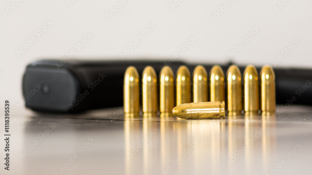 Photos of the black gun and its bullets. Photos of the black gun and its bullets.