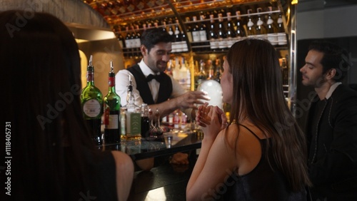 Sticker Feeling good smell tasty serving special drink to VIP customer with couple in mist smoky classical mixing whiskey liquor cocktail by smart bartender opening at beverage counter bar luxury