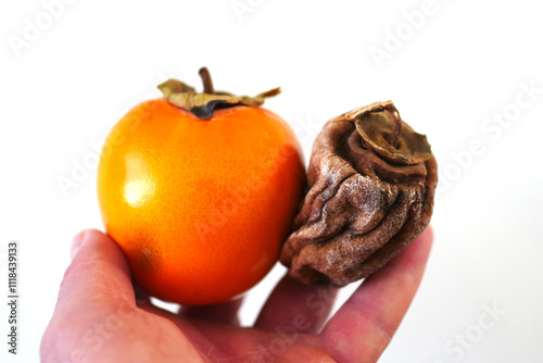 Obraz na płótnie Dried persimmon,Dried persimmon is a nutritious, vitamin-rich, mineral-rich and sweet dried fruit variety w salonie