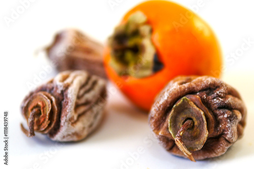 Obraz na płótnie Dried persimmon,Dried persimmon is a nutritious, vitamin-rich, mineral-rich and sweet dried fruit variety w salonie
