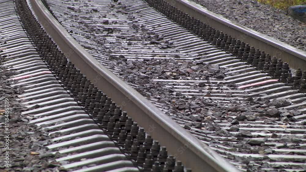 Railway rails with concrete sleepers. Close-up.