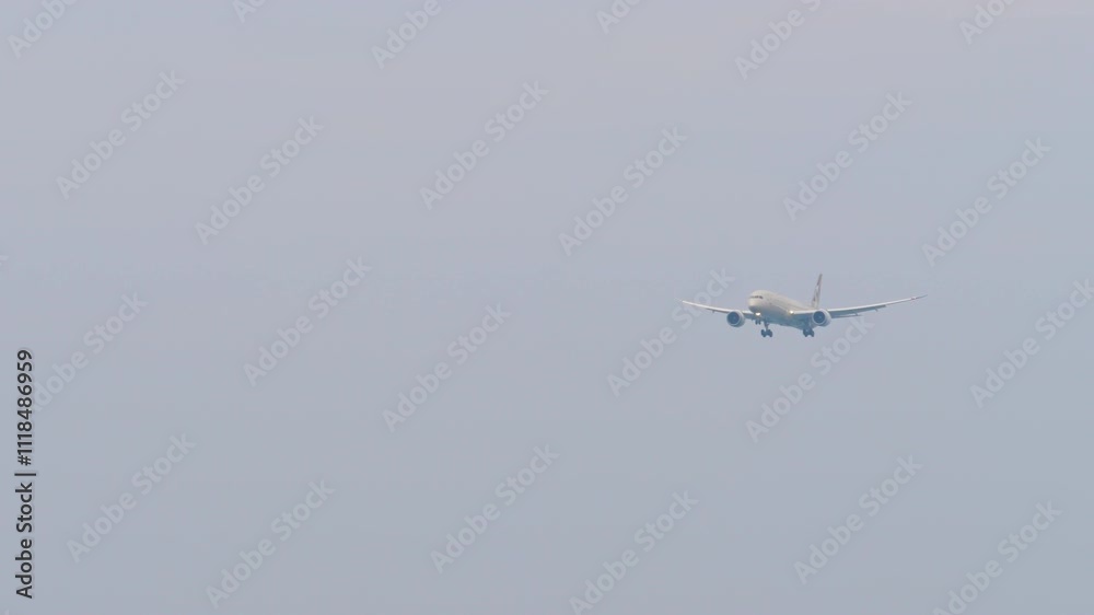 Jet airliner landing at Phuket airport. Airplane flying