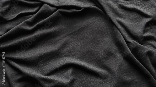 Draped dark gray fabric texture.