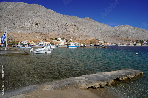 boats in the picturesque and beautiful waters of Symi island marina photo