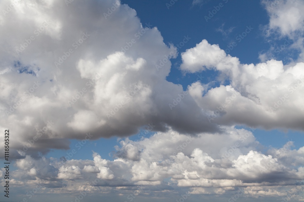 Obraz premium Puffy clouds.View beautiful sky Background