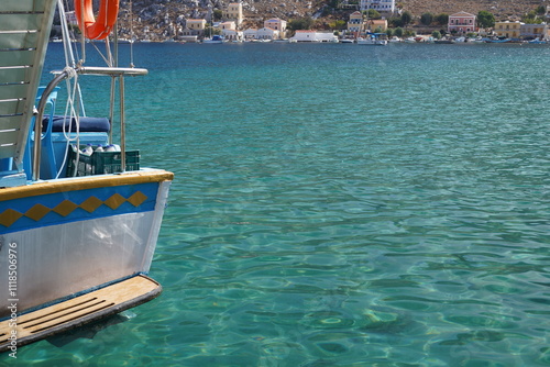 boats in the picturesque and beautiful waters of Symi island marina photo