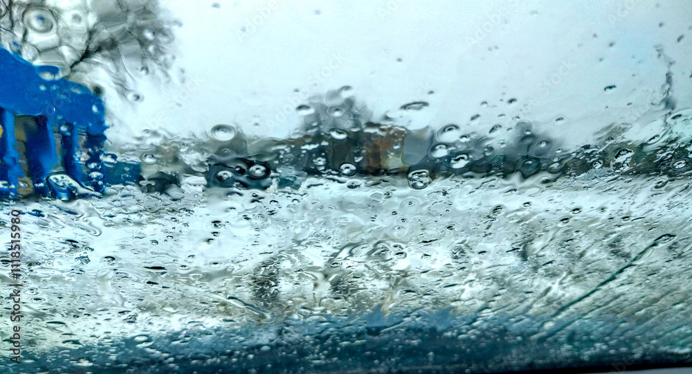 Photo of raindrops on car glass